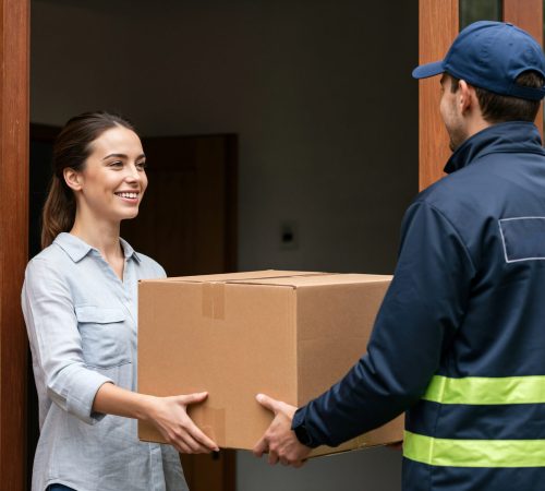 delivery-man-handing-package-woman-her-doorstep